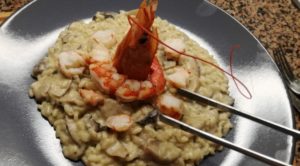 Impiattamento risotto ai porcini con gamberoni argentini -Risoinfiore