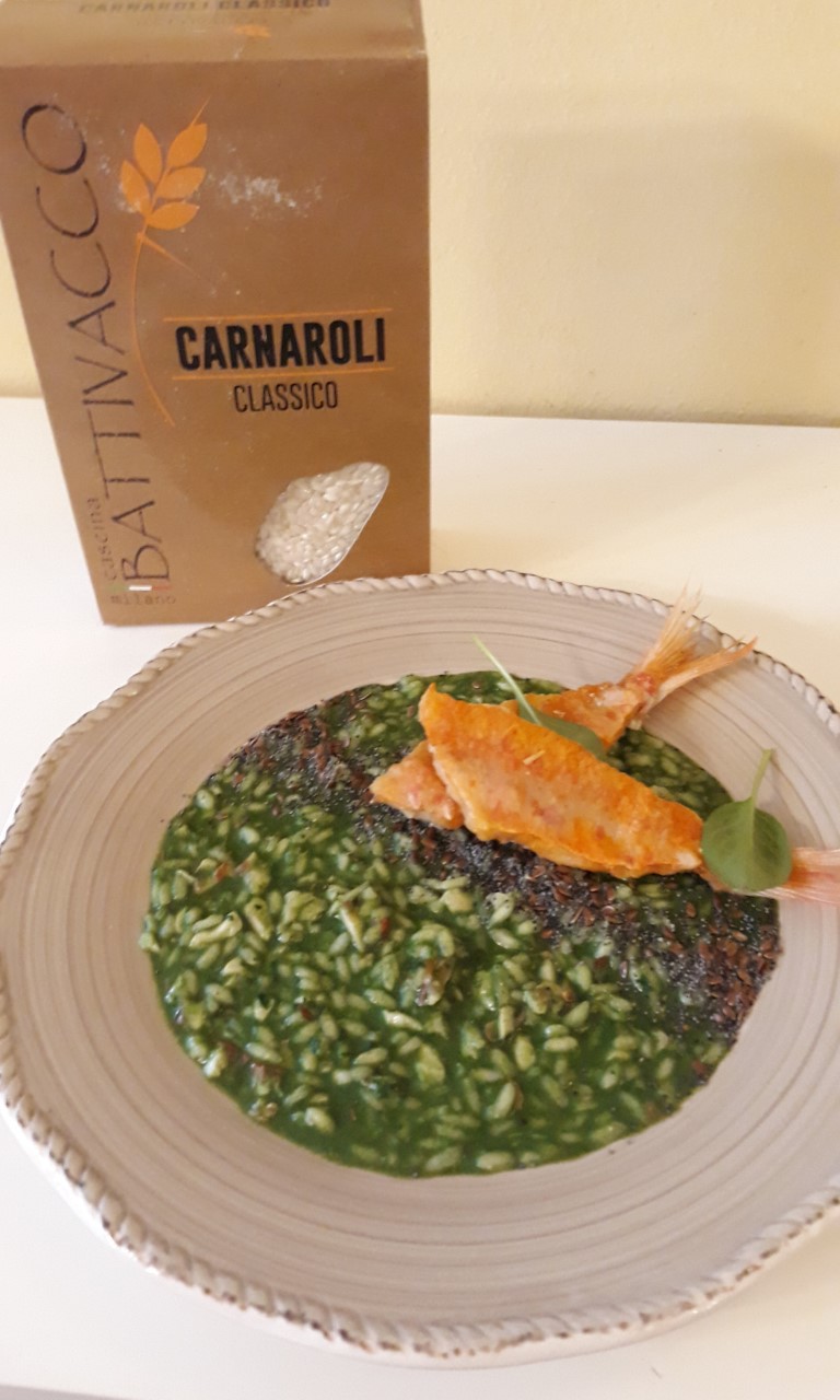 Impiattamento risotto in crema di spinacino con triglie di ...
