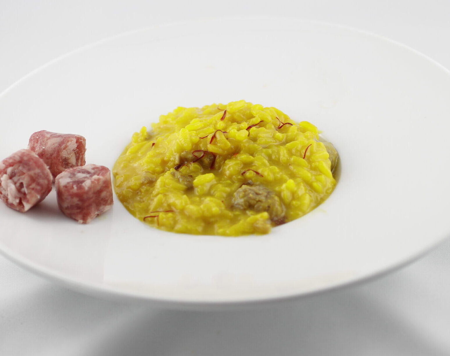 risotto con luganega e pistilli di zafferano