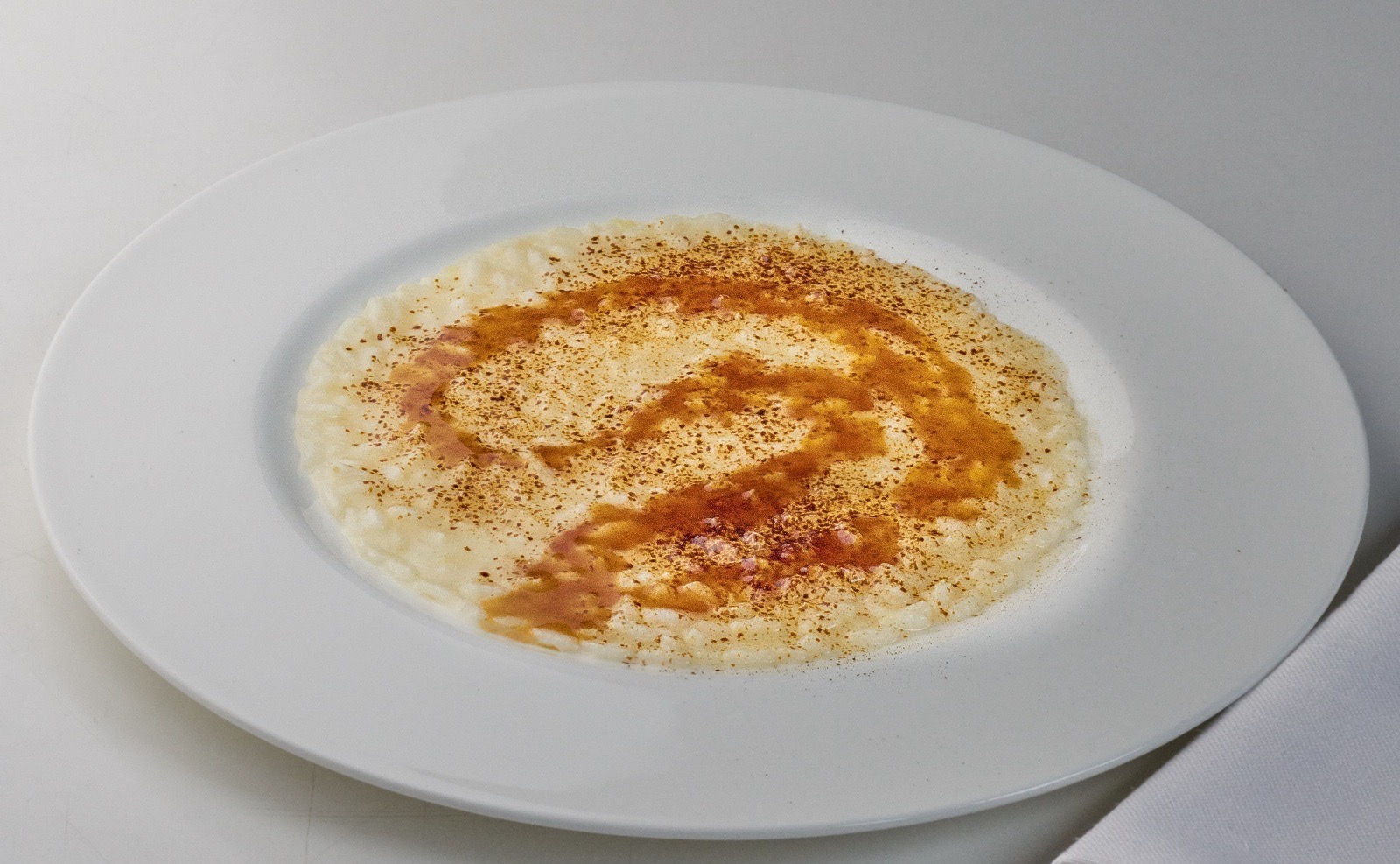 risotto al limone e sugo d'arrosto e liquirizia